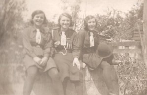 The girls in their Guide uniforms several years before in 1937, Monica, Audrey, Beryl
